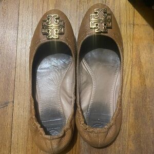 Well worn leather flats